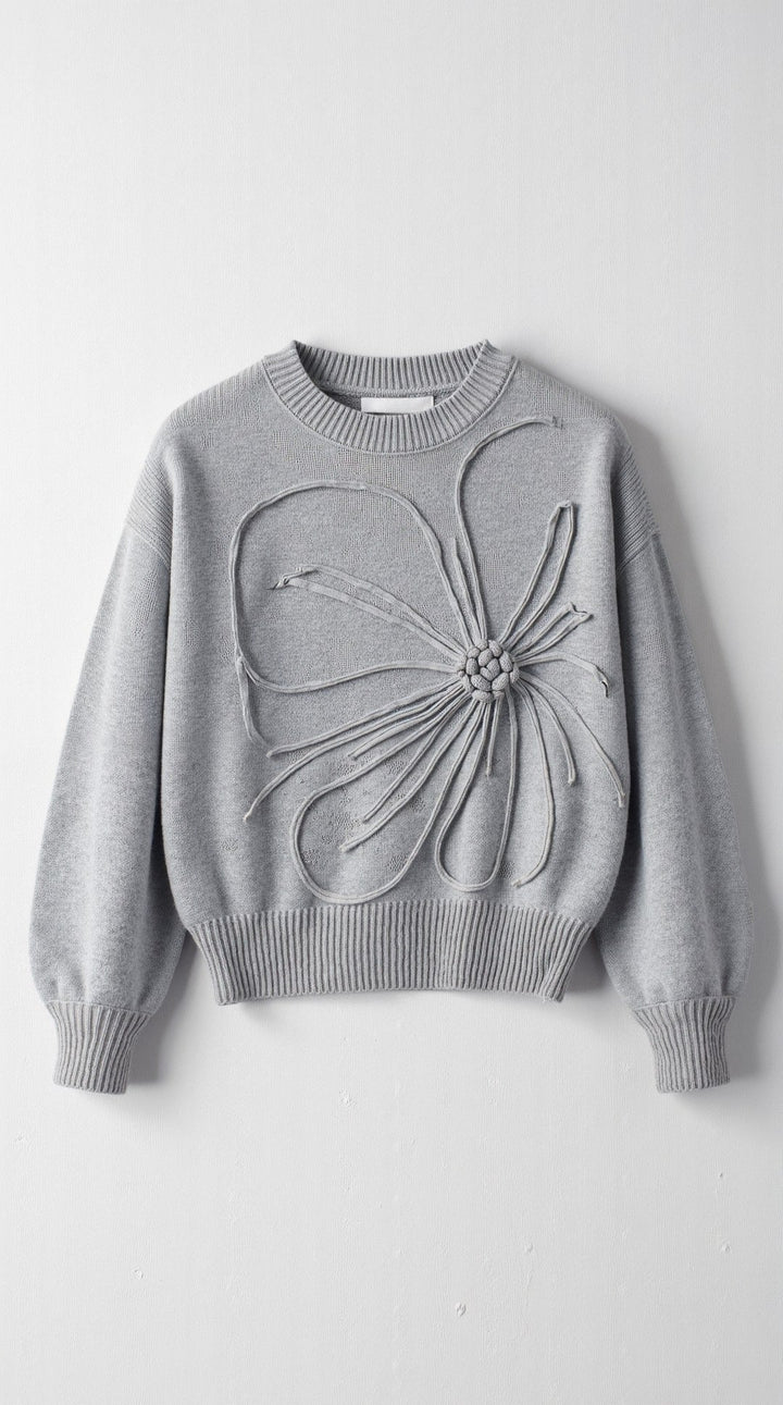 Knitted sweater with floral design
