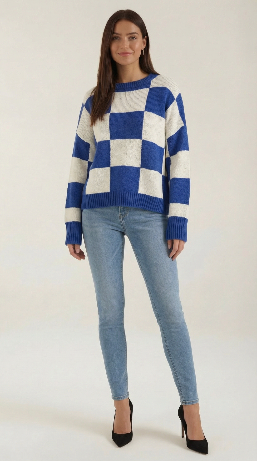Knitted sweater with a check design