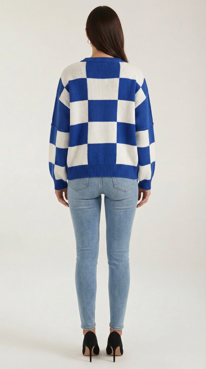 Knitted sweater with a check design