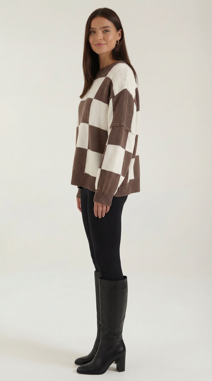 Knitted sweater with a check design