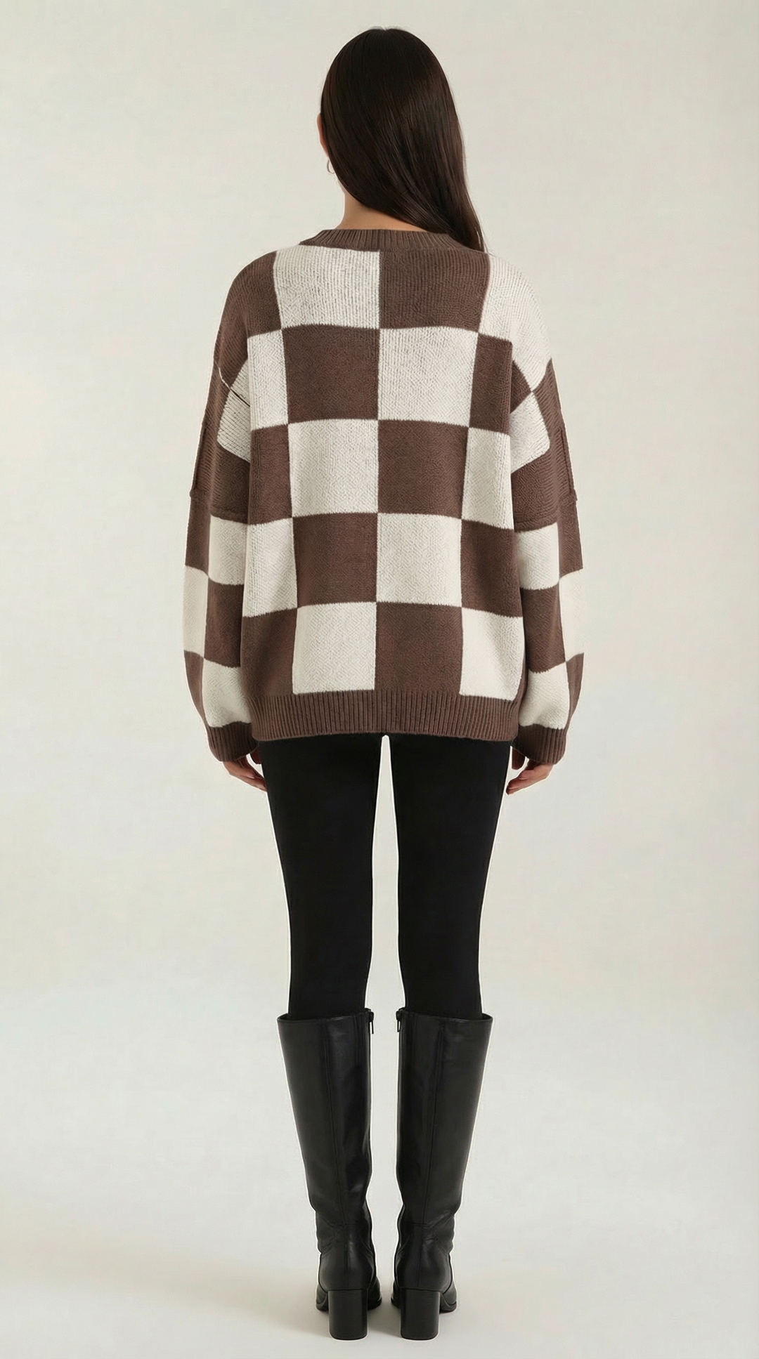 Knitted sweater with a check design