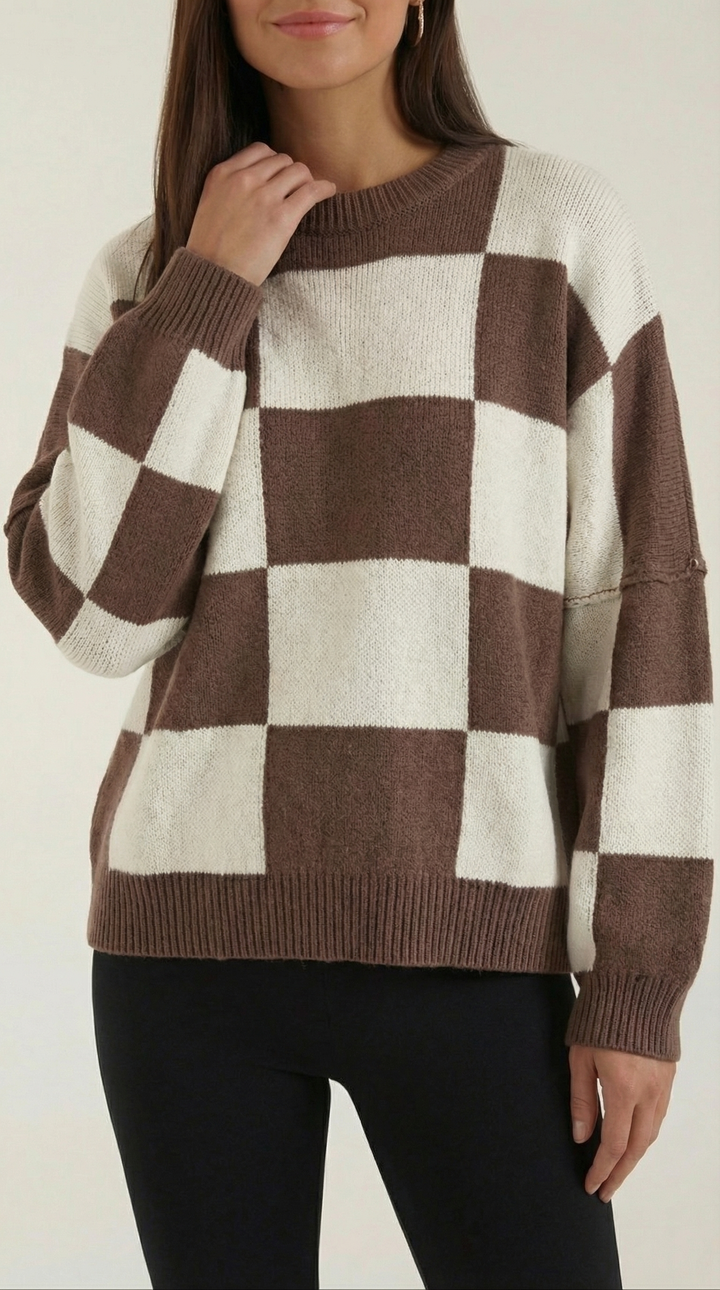 Knitted sweater with a check design