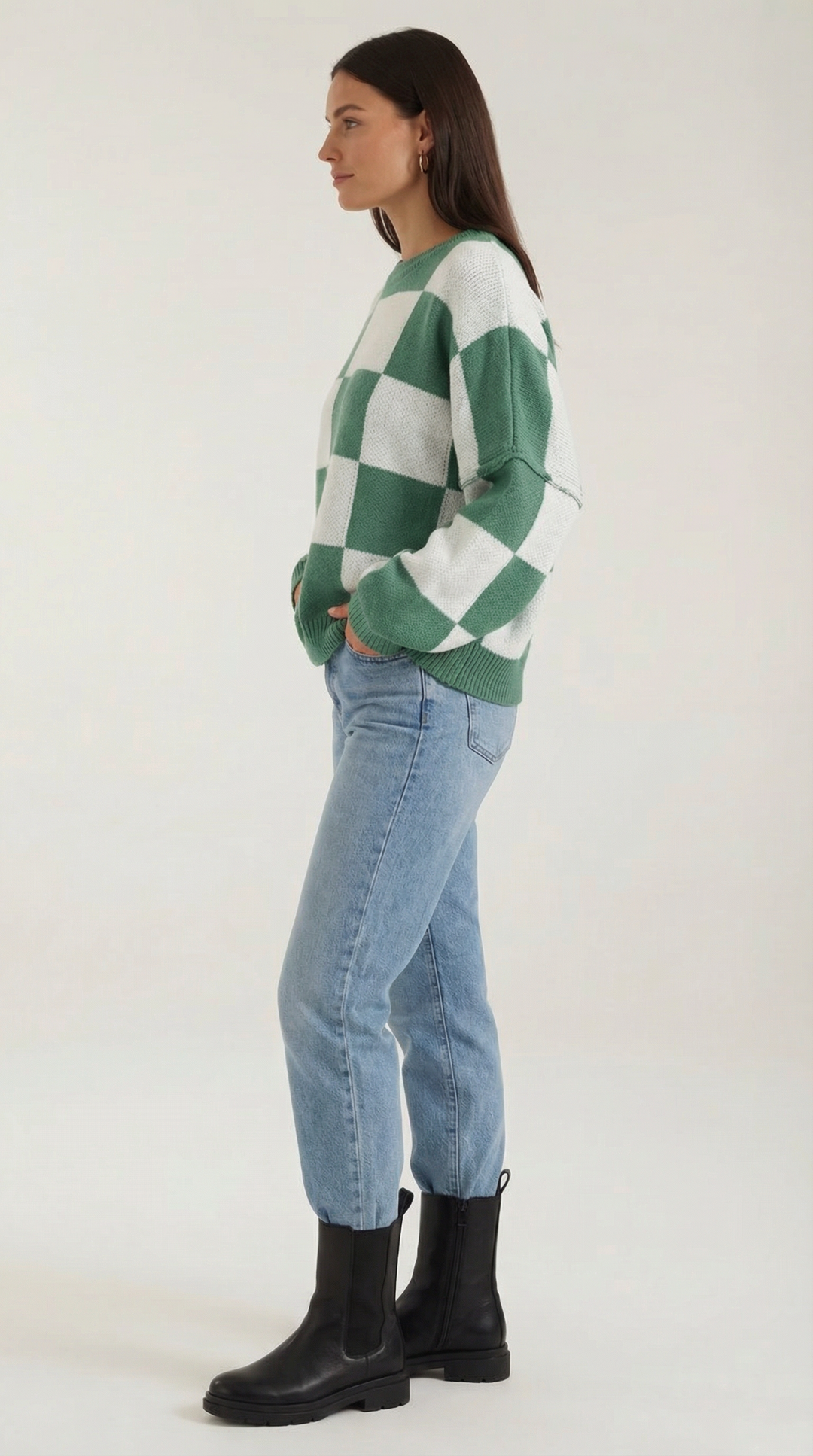 Knitted sweater with a check design