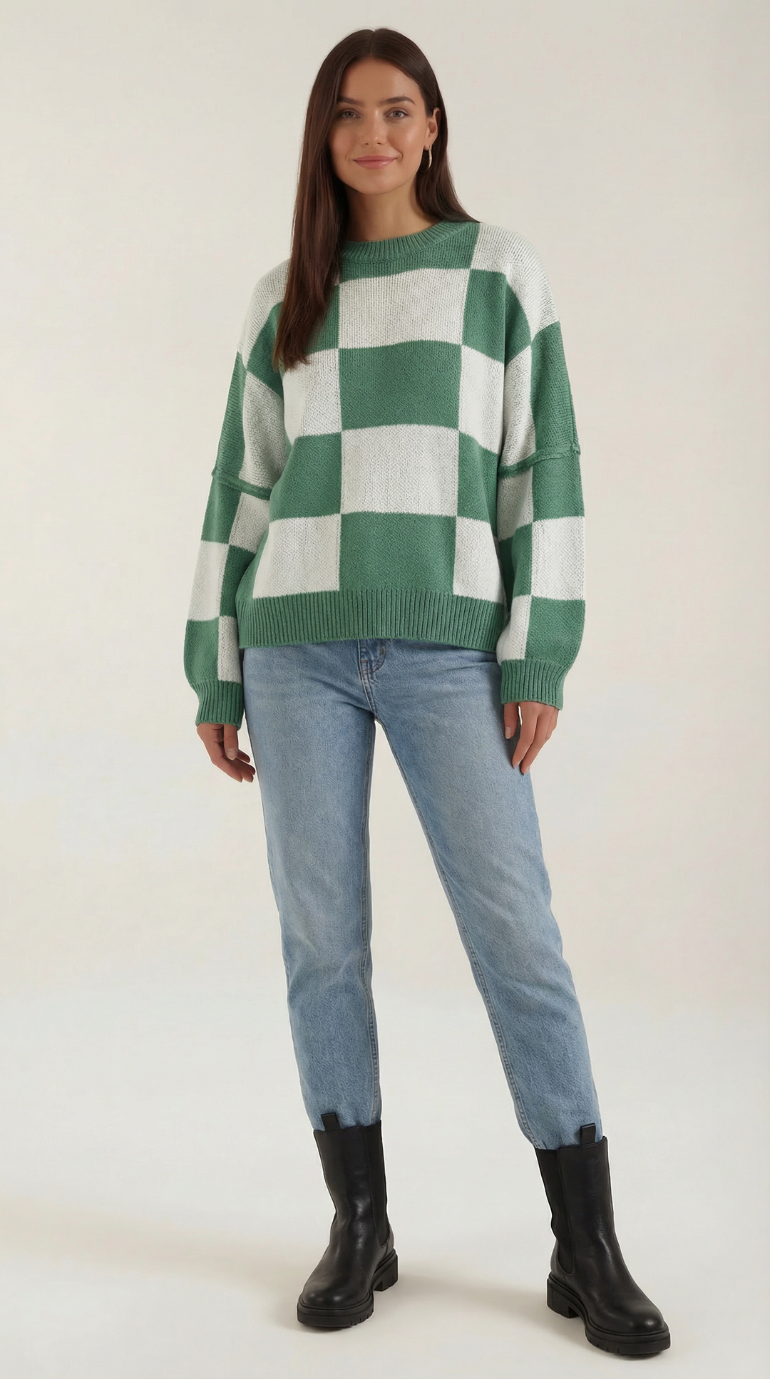 Knitted sweater with a check design
