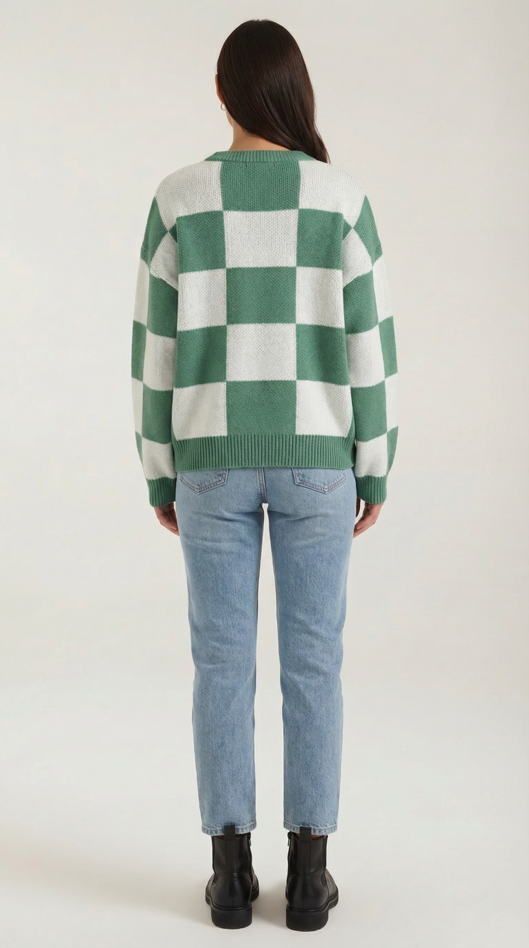 Knitted sweater with a check design
