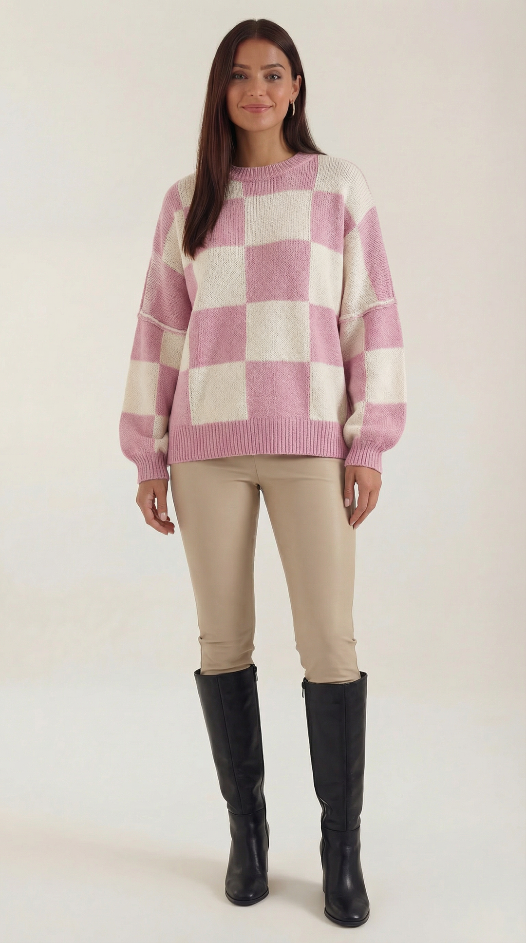 Knitted sweater with a check design