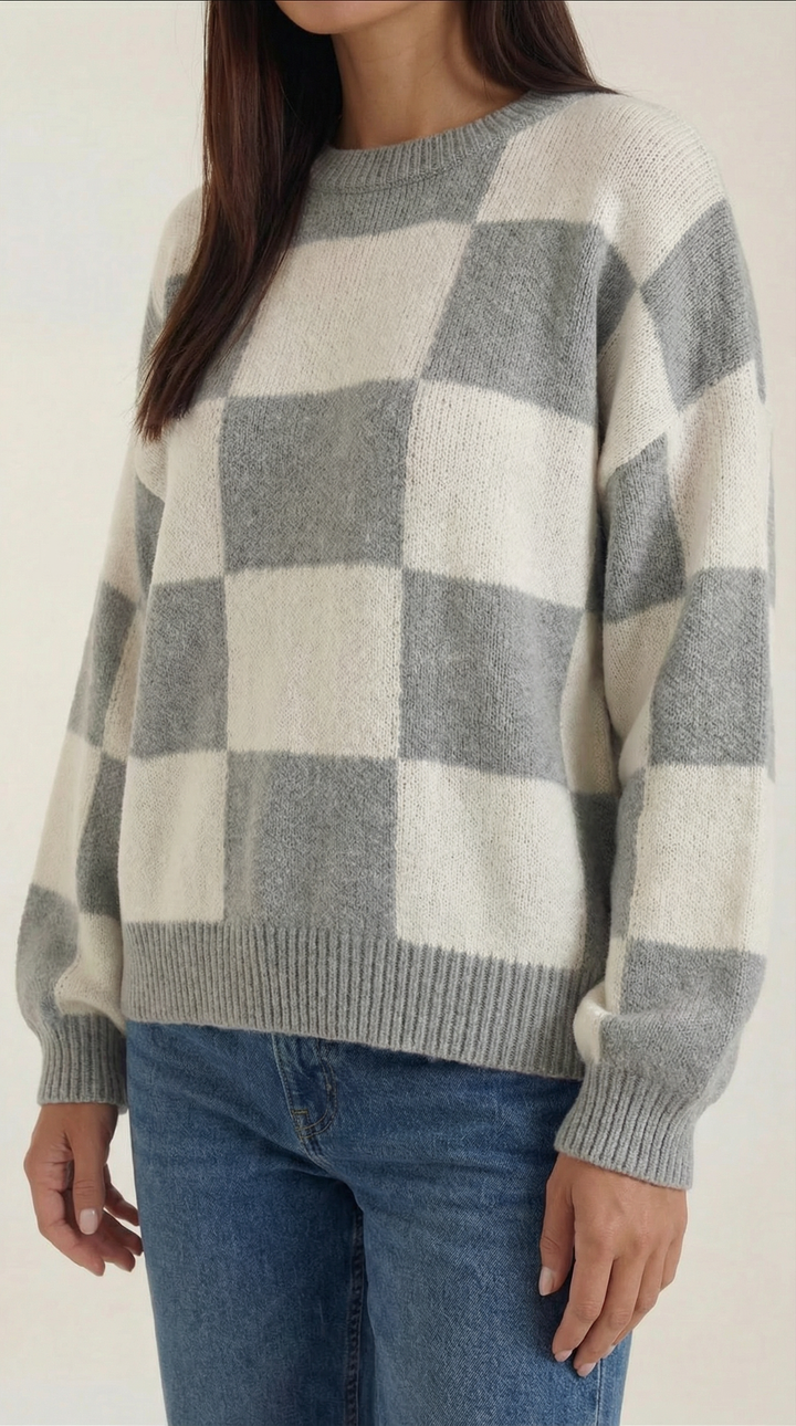Knitted sweater with a check design