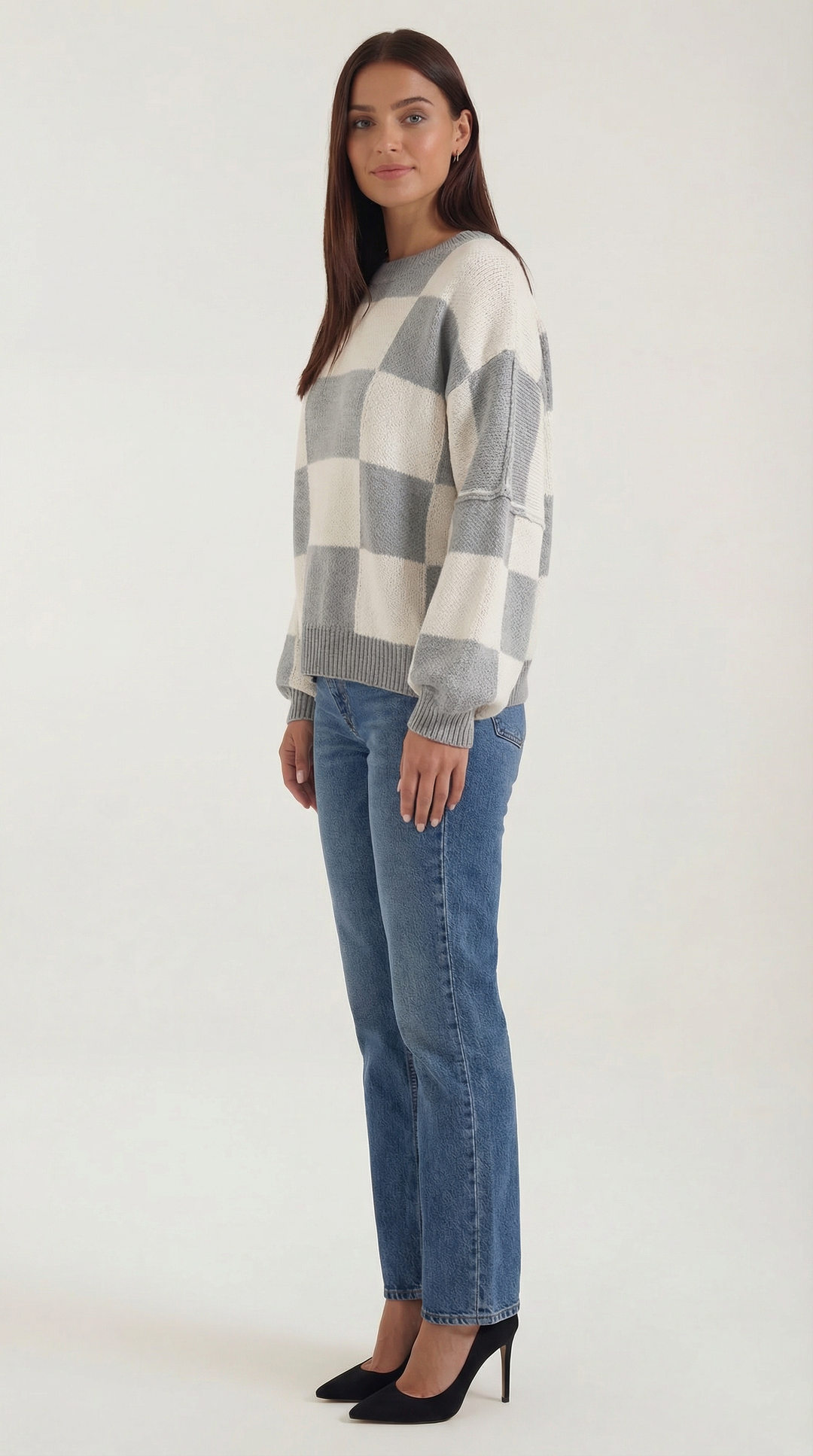 Knitted sweater with a check design