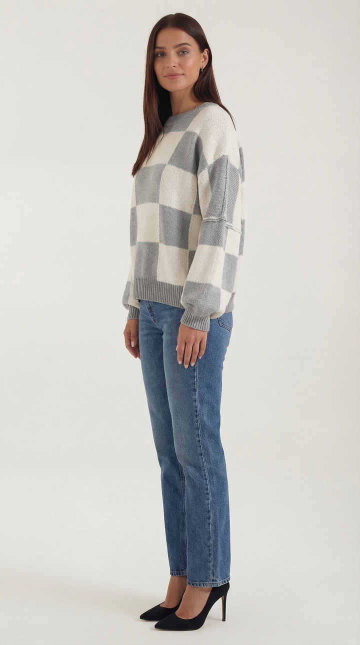 Knitted sweater with a check design