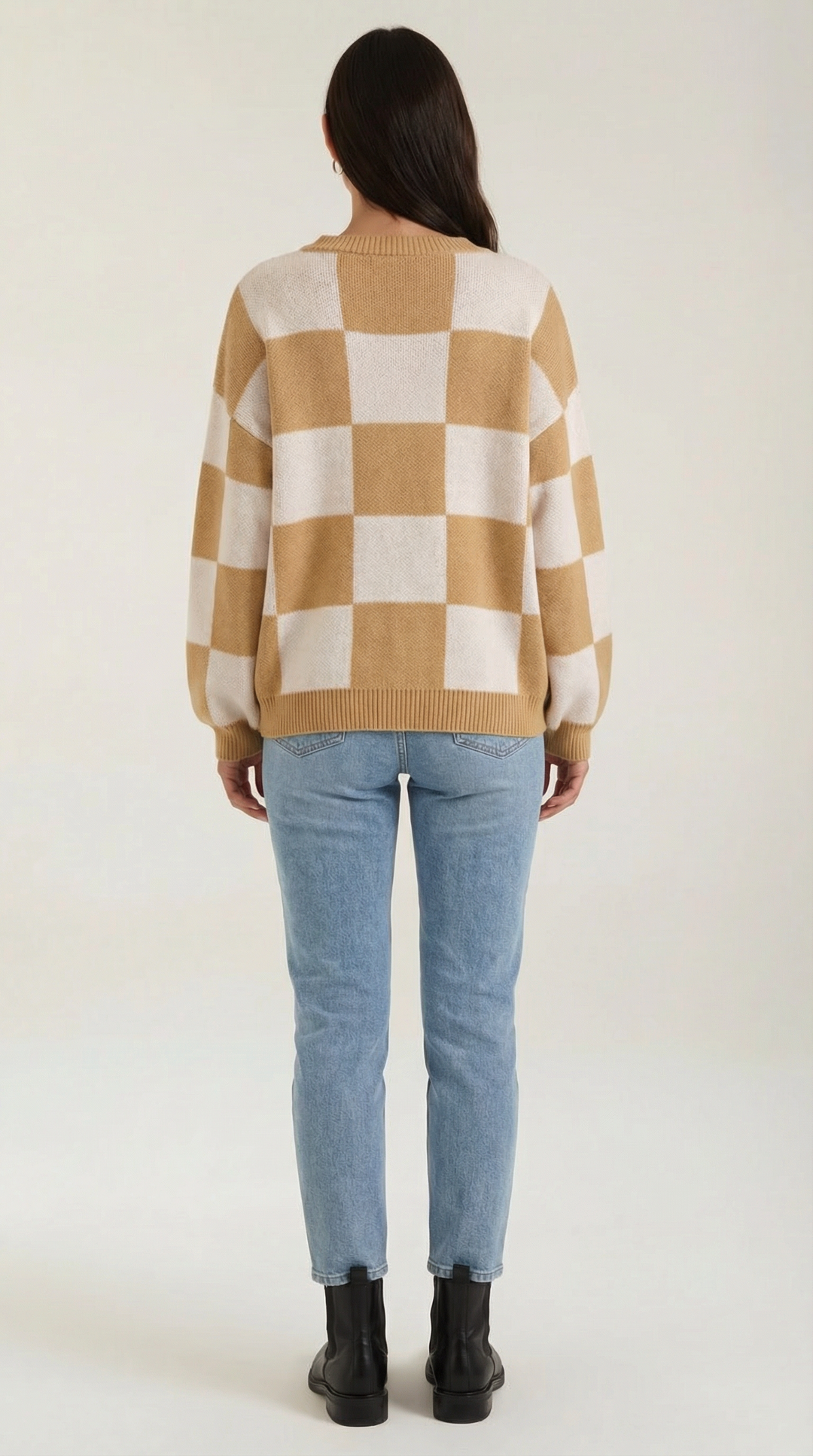 Knitted sweater with a check design