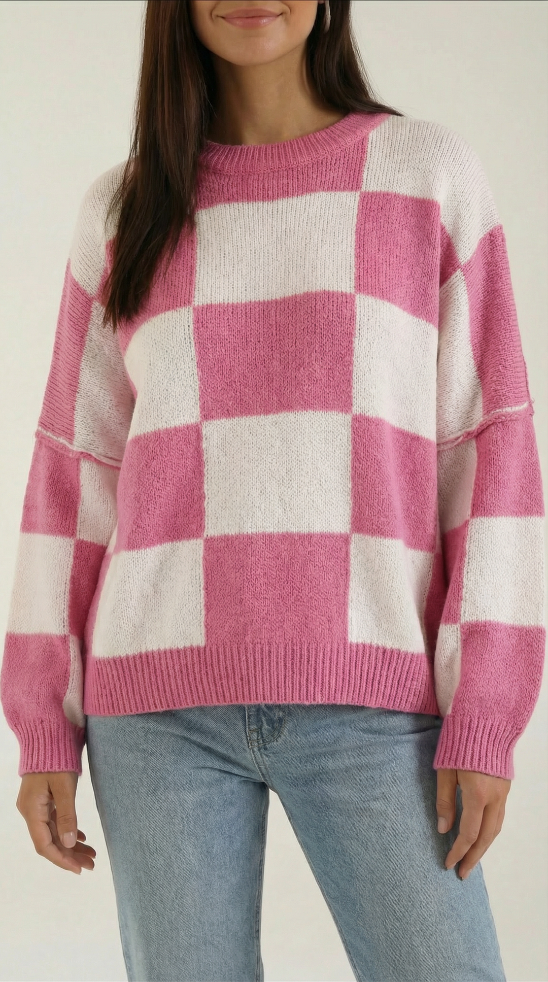 Knitted sweater with a check design