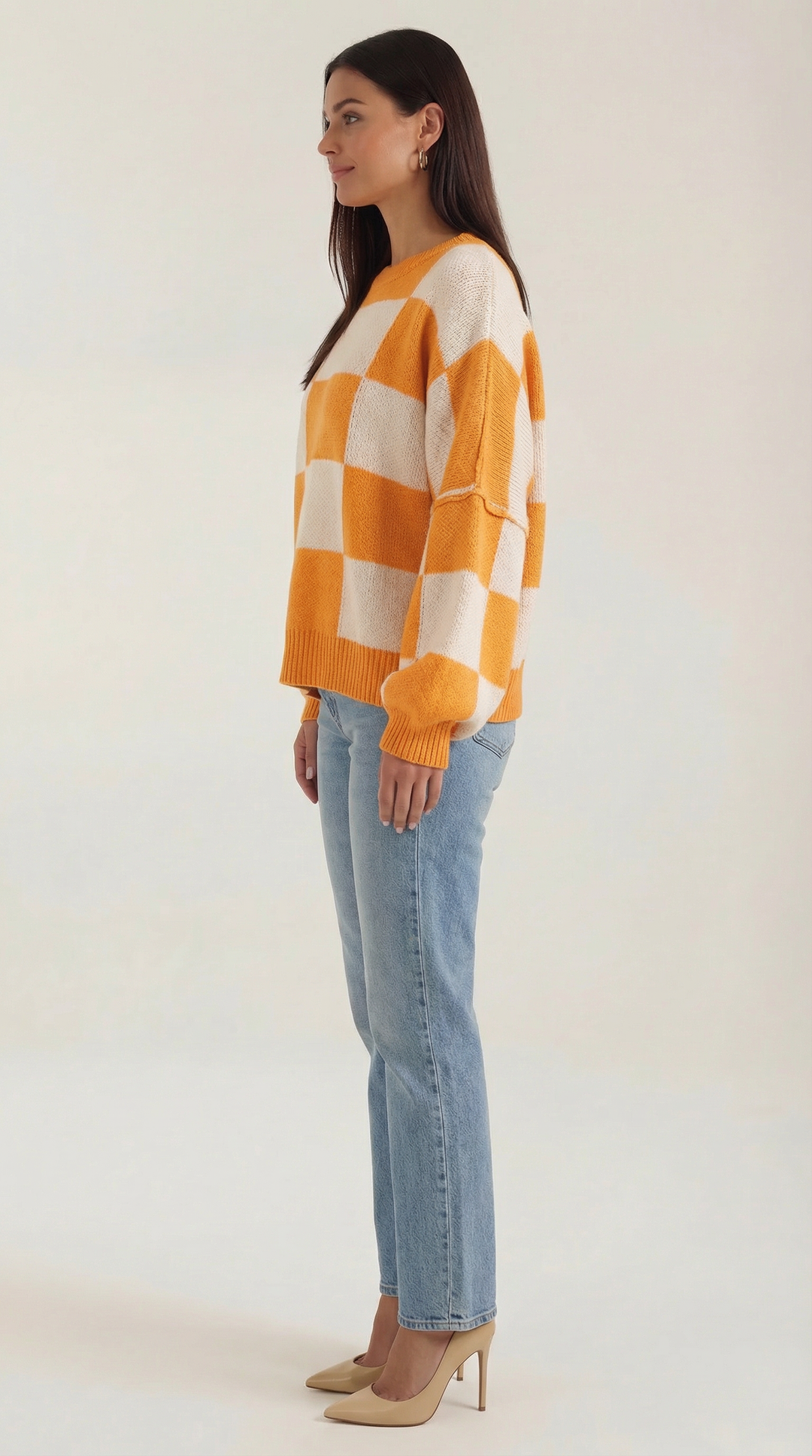 Knitted sweater with a check design