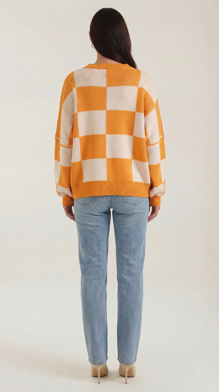Knitted sweater with a check design
