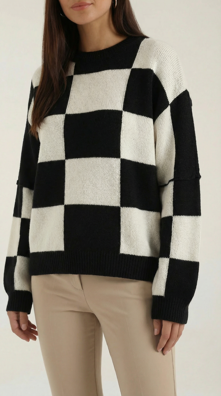 Knitted sweater with a check design