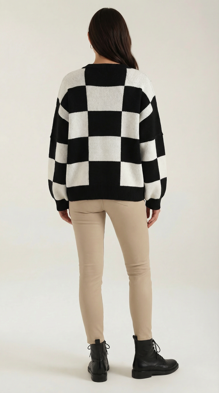 Knitted sweater with a check design